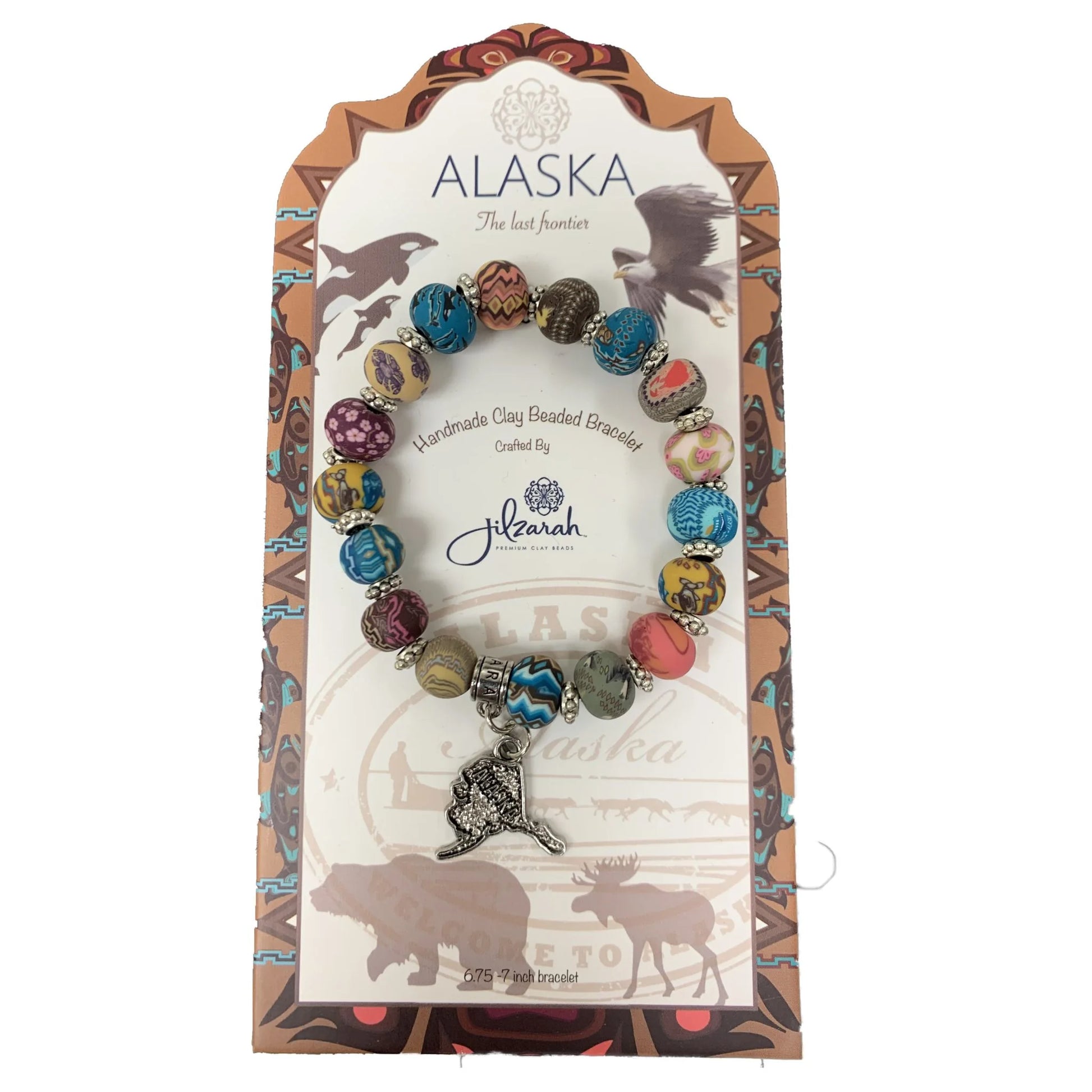 Colorful beaded bracelet with a metal Alaska charm on a branded card.