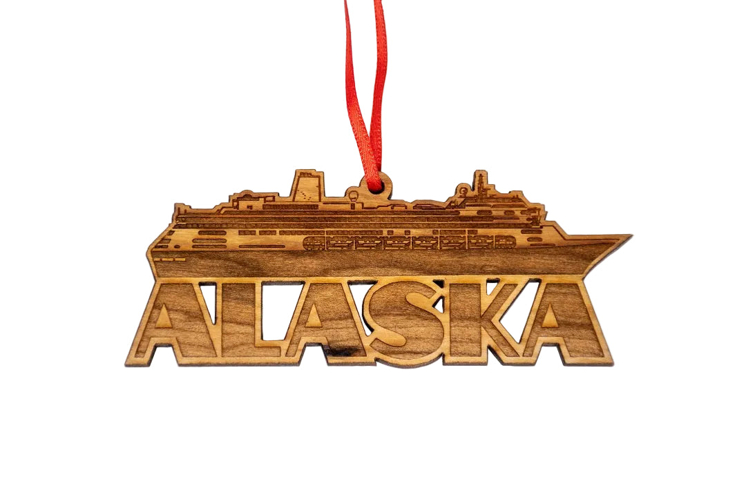 Wooden ornament shaped like a cruise ship with 'Alaska' text 