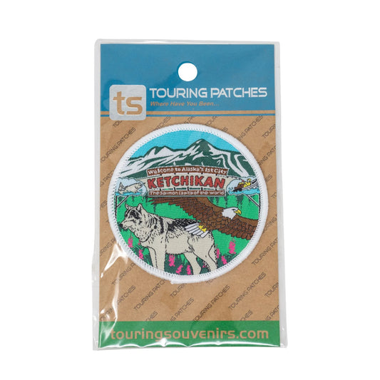 Patch with mountain and wolf design on Touring Patches packaging