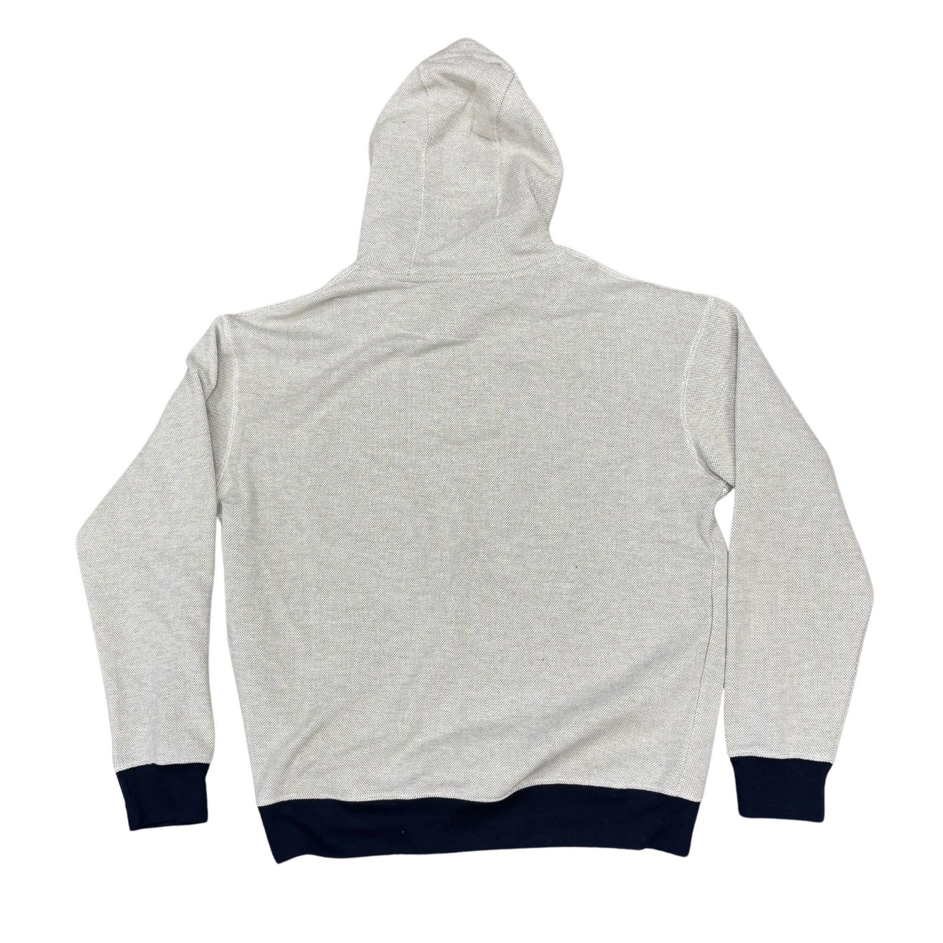 Gray hoodie with navy cuffs and hem on a white background