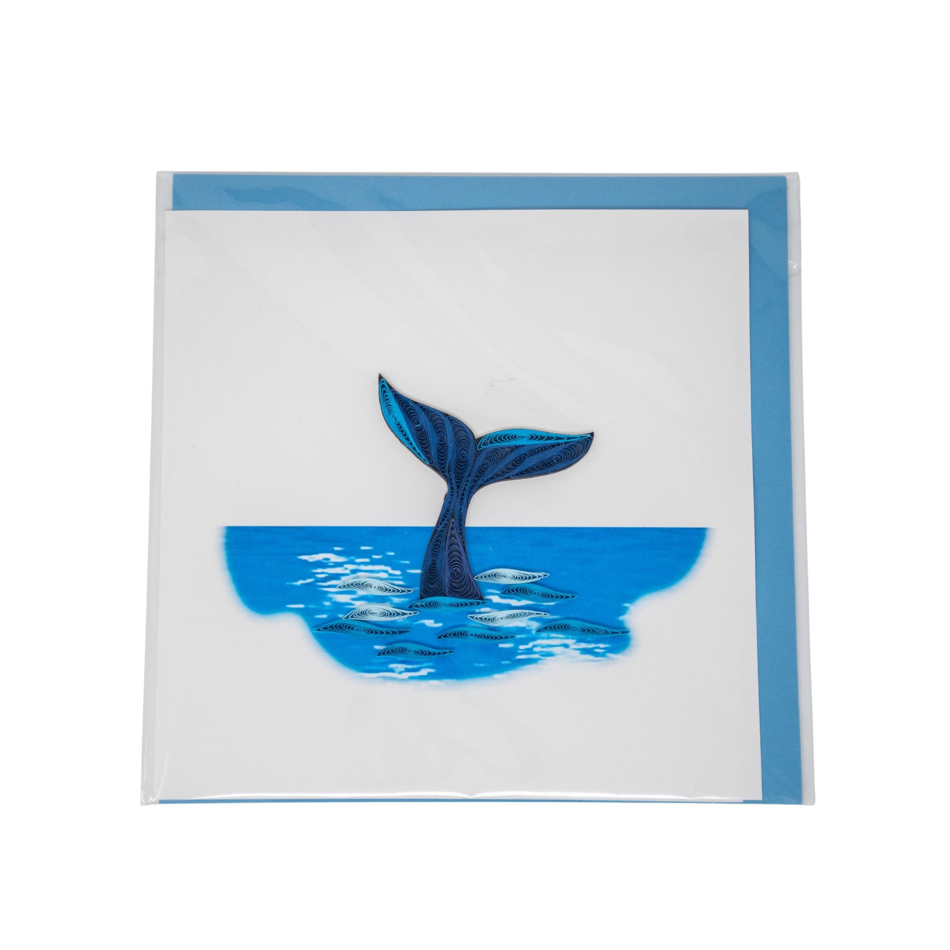 Card with a whale tail emerging from water on a white background