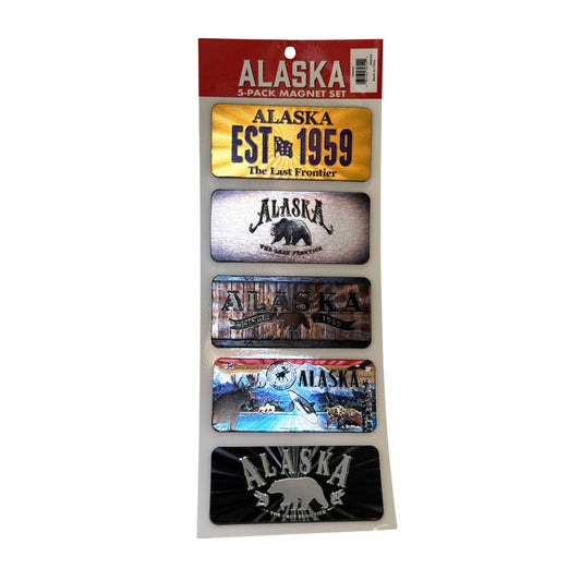 Packaged set of Alaska-themed magnets with various designs on a white background