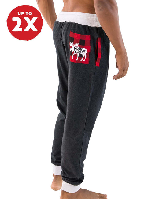 Dark gray sweatpants with a red and black plaid patch with a white moose on it on a white background