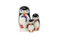 Three nesting dolls with puffin design on a white background