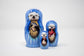 Set of nesting dolls with sea otter illustrations on a white background