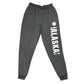 Gray sweatpants with 'Alaska' text