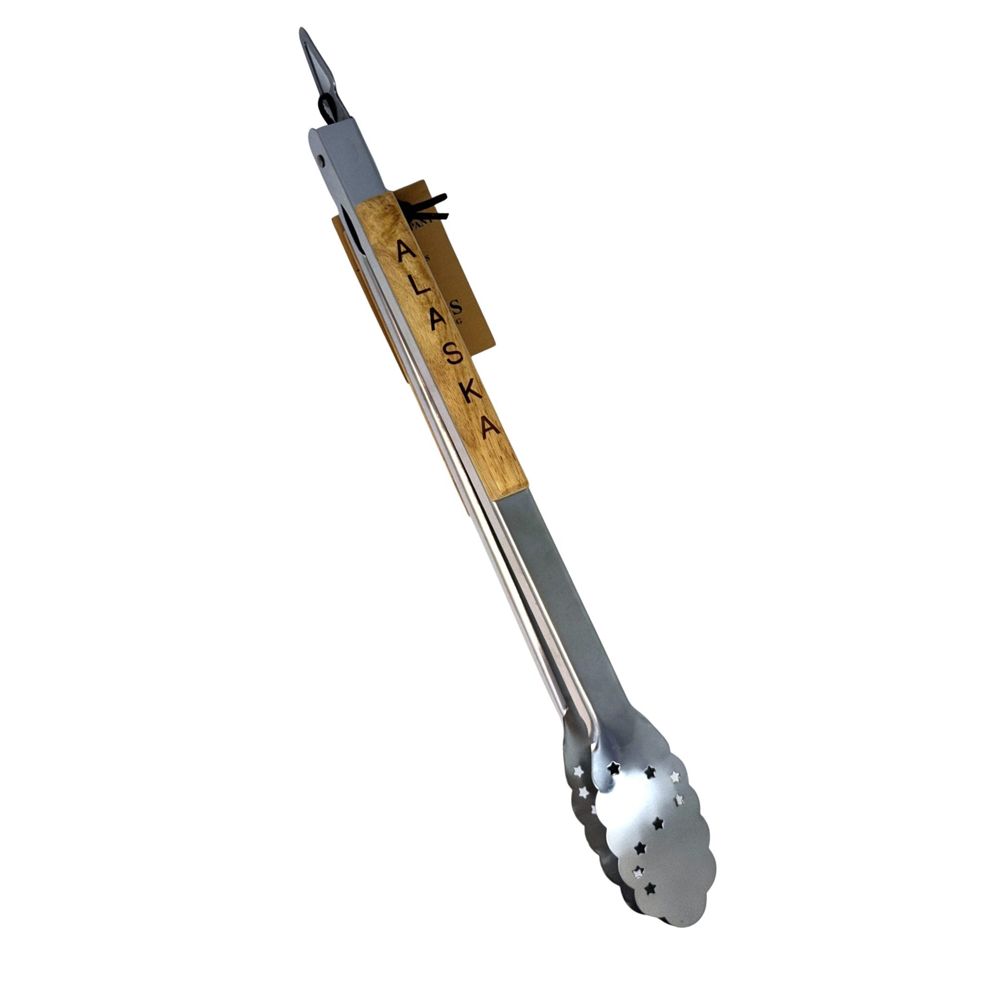 Metal tongs with wooden handle and 'Alaska' engraving on a white background