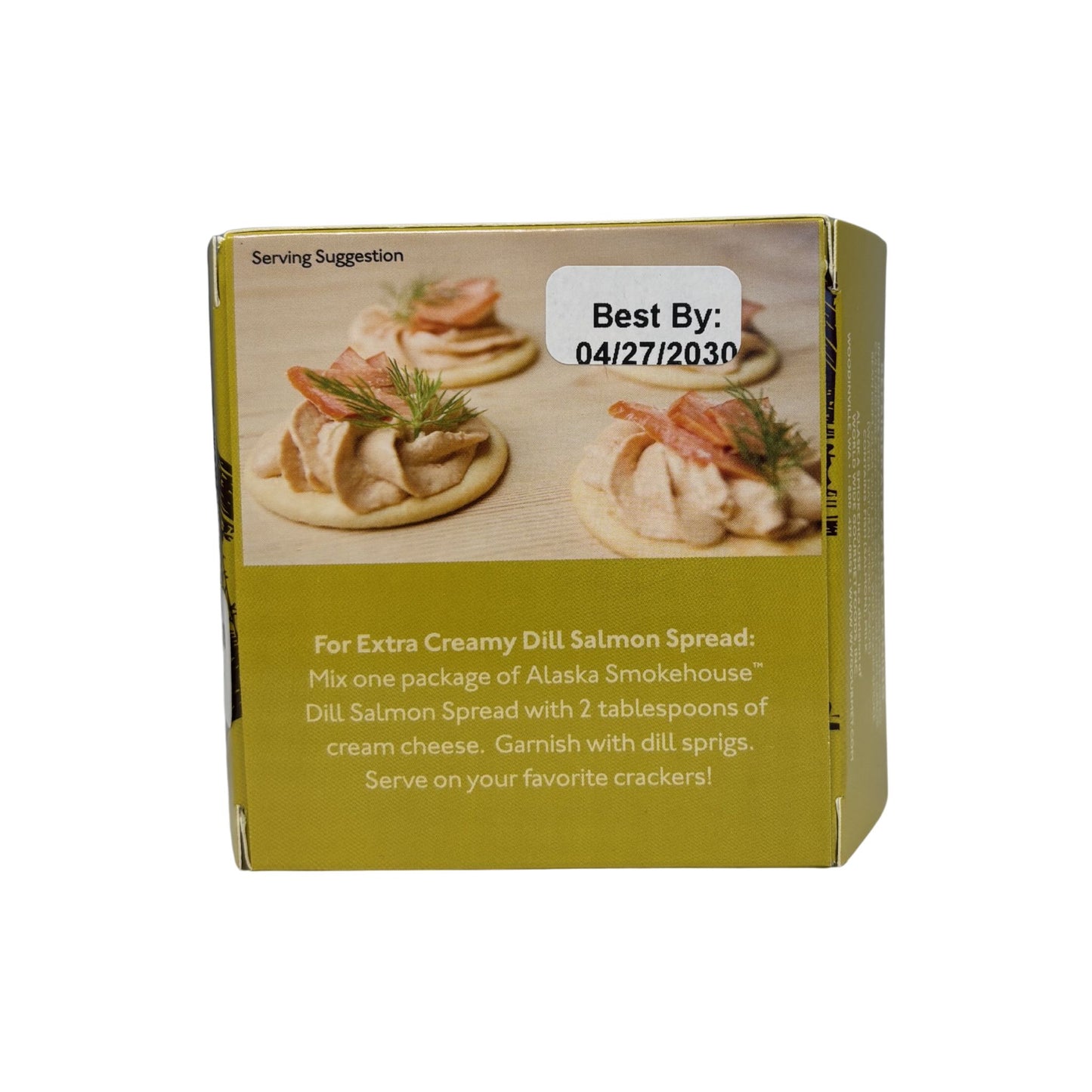 Box of Alaska Smokehouse Dill Salmon Spread with serving suggestion on a white background