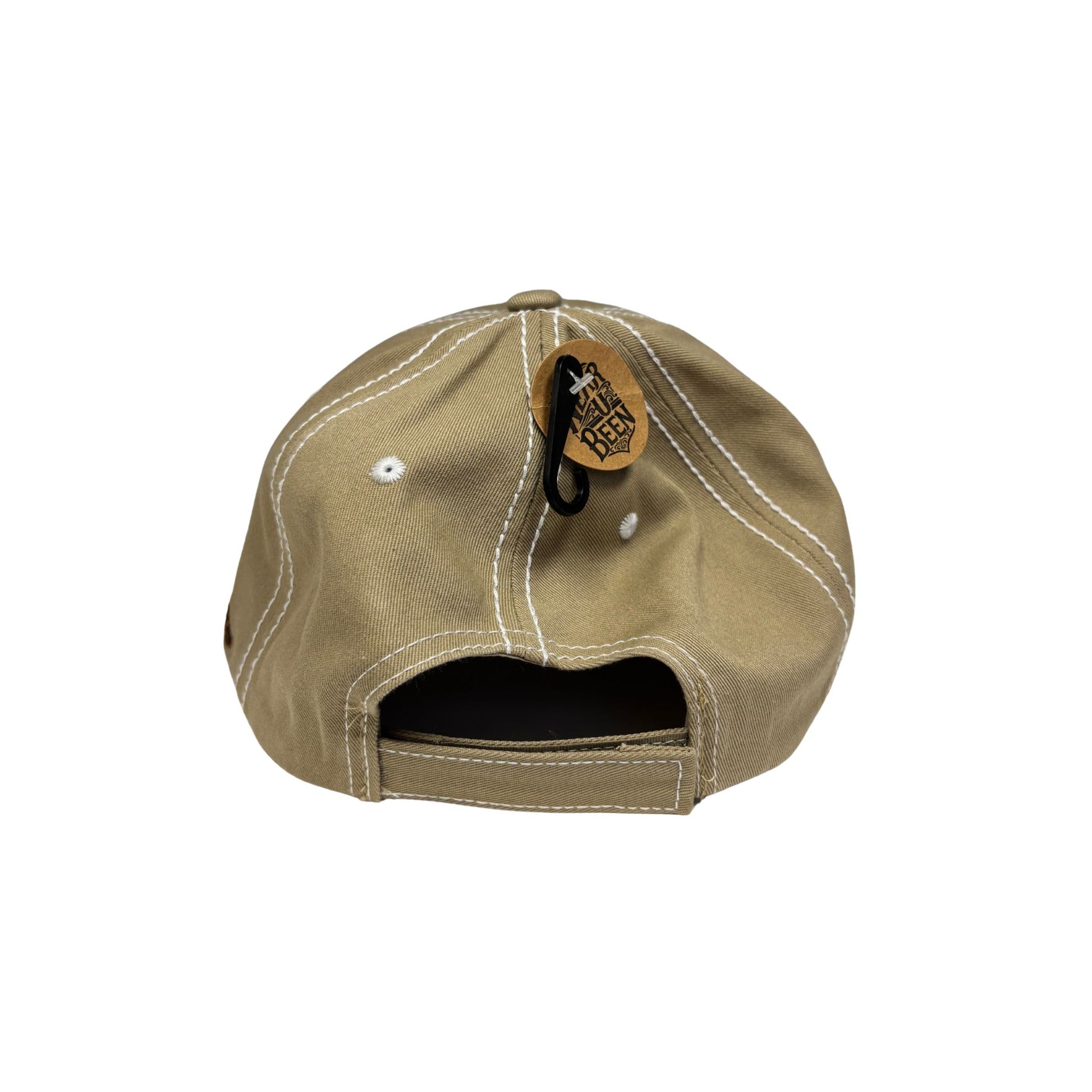 Beige cap with a tag 