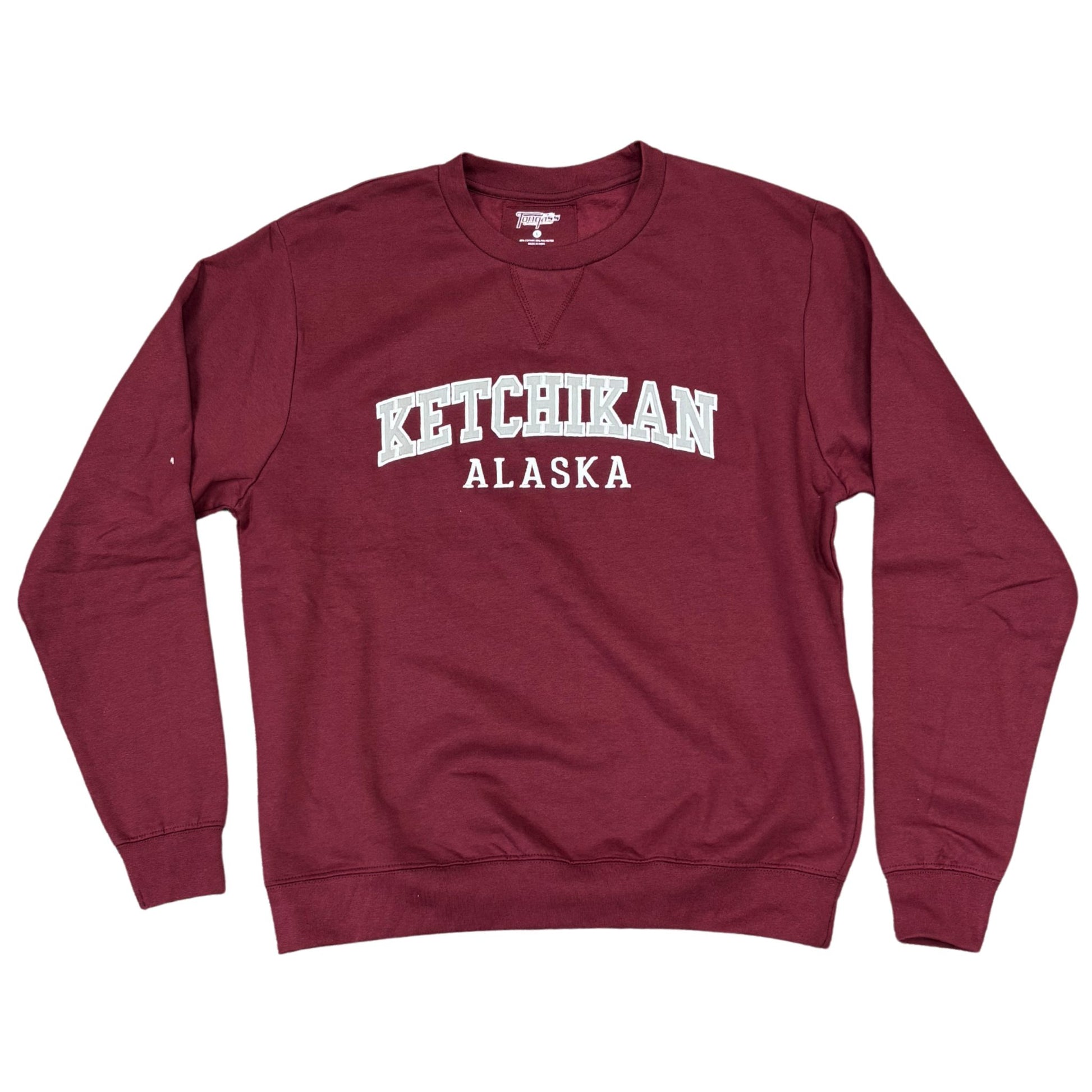 Maroon sweatshirt with 'Ketchikan Alaska' text on a white background