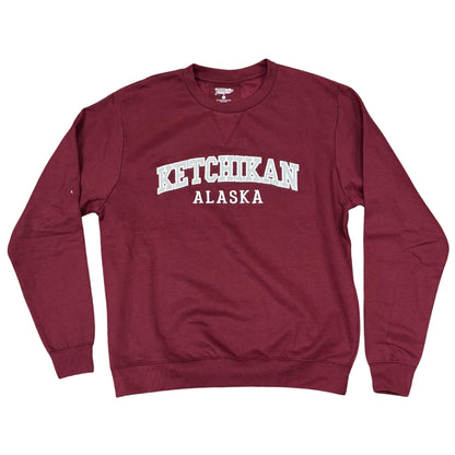 Maroon sweatshirt with 'Ketchikan Alaska' text on a white background