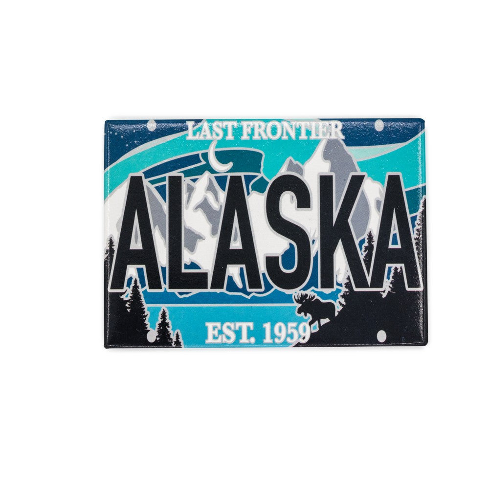 Alaska-themed decorative magnet with mountain and tree design 
