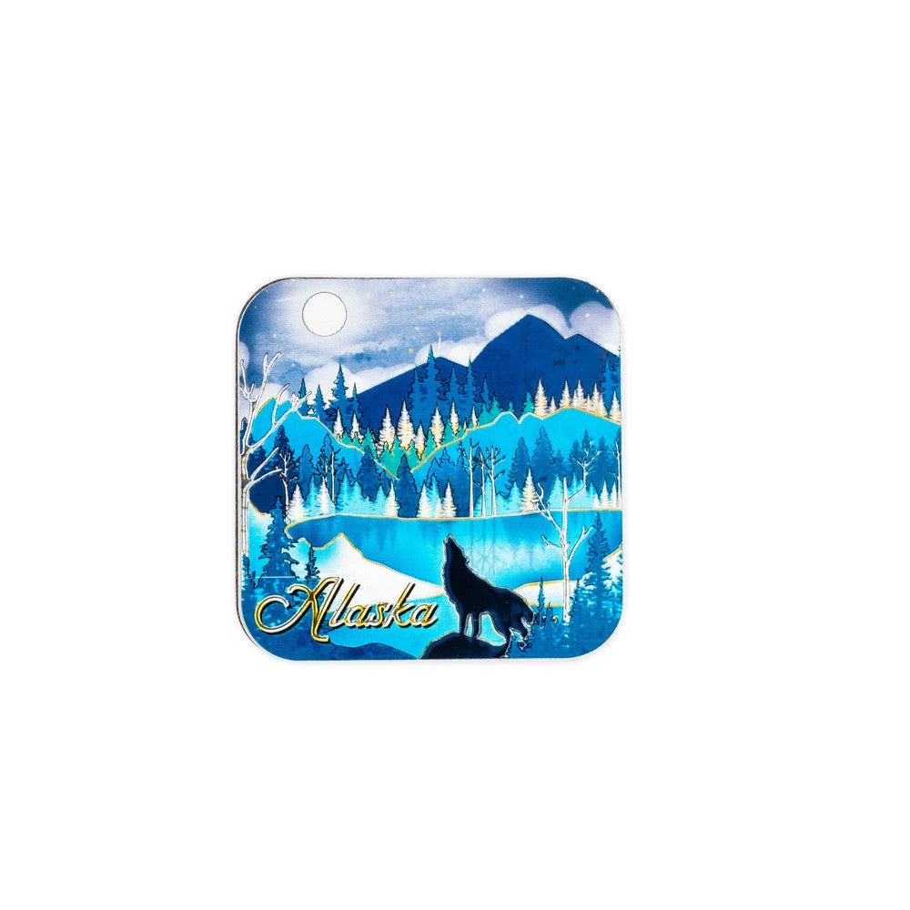 Alaska-themed magnet with a wolf and mountain landscape design 