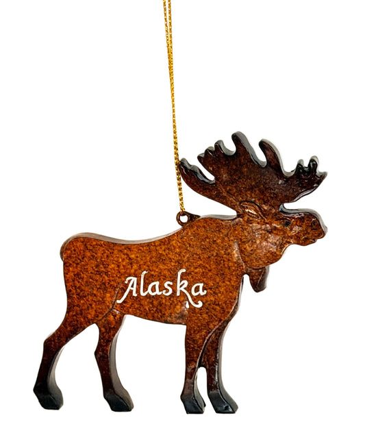 Moose-shaped ornament with 'Alaska' text on a white background