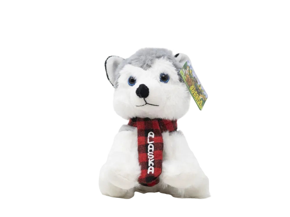 Plush toy husky dog with a red and black checkered scarf 