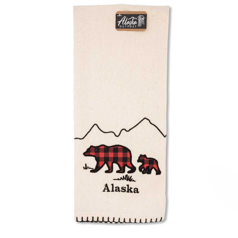 Kitchen towel with plaid bears and mountains design, featuring 'Alaska' text, on a white background.