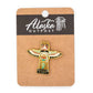 Colorful totem pin on a card with 'Alaska Outpost' branding