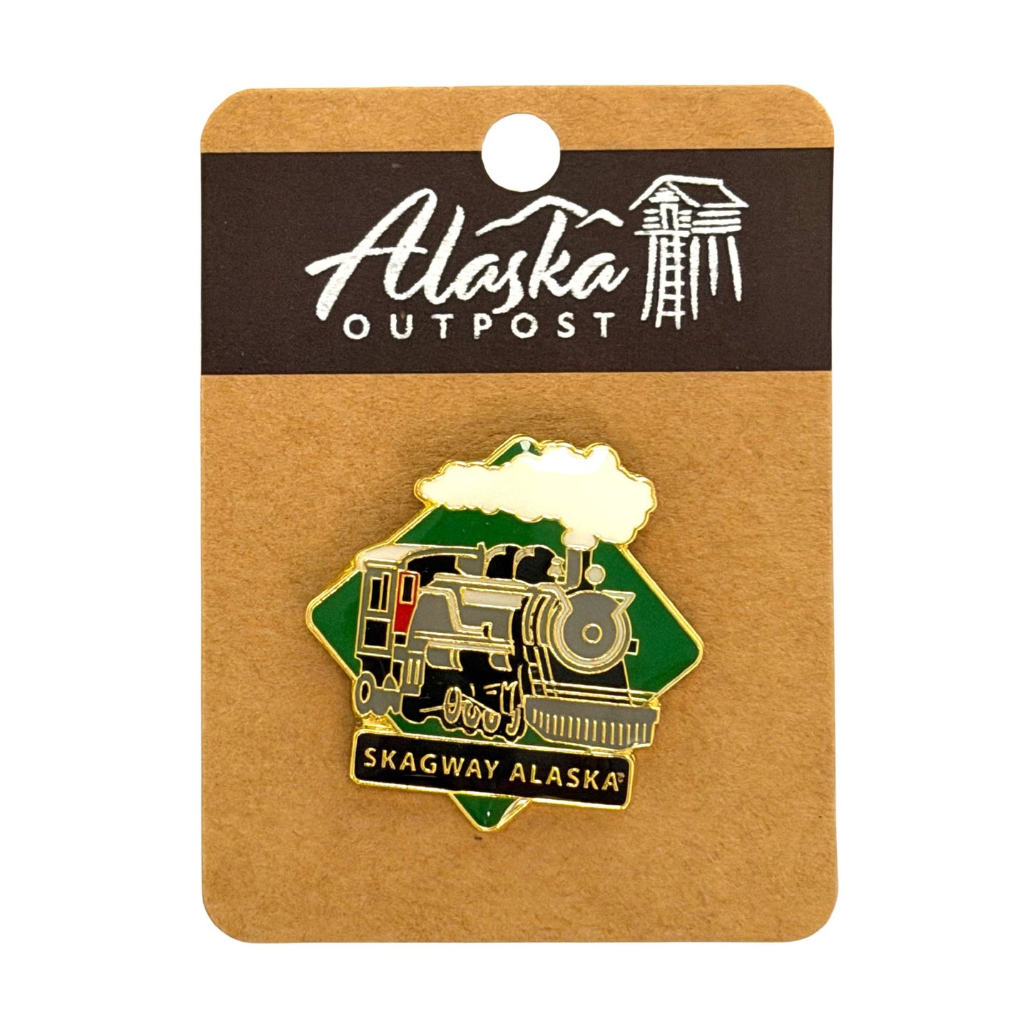 Pin with steam locomotive design on a card labeled 'Alaska Outpost'