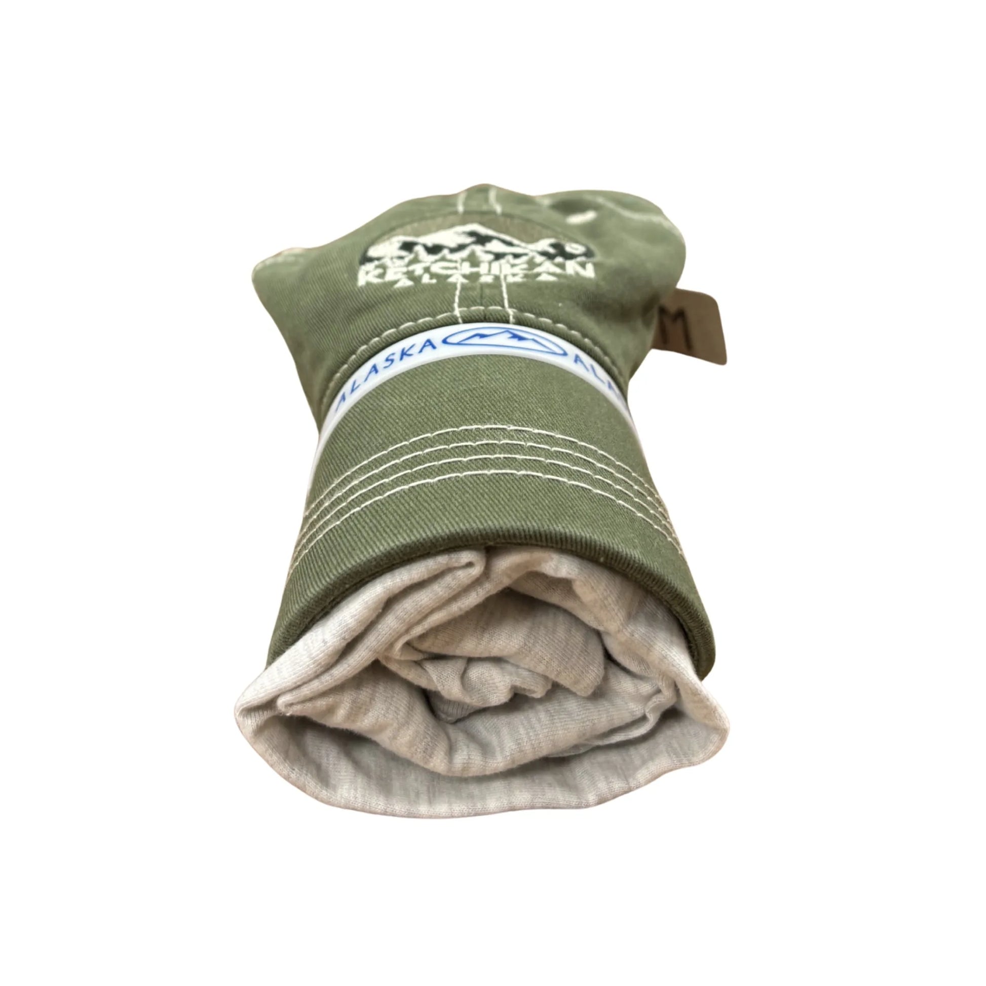 Green hat with a rolled shirt