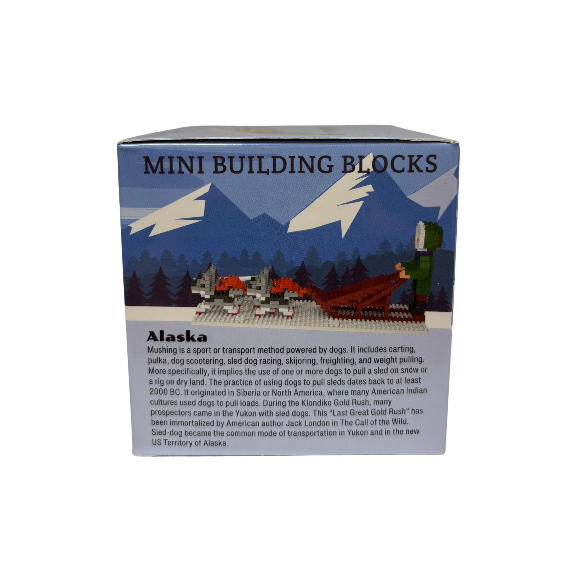 Box of mini building blocks with a scenic design and text about Alaska.