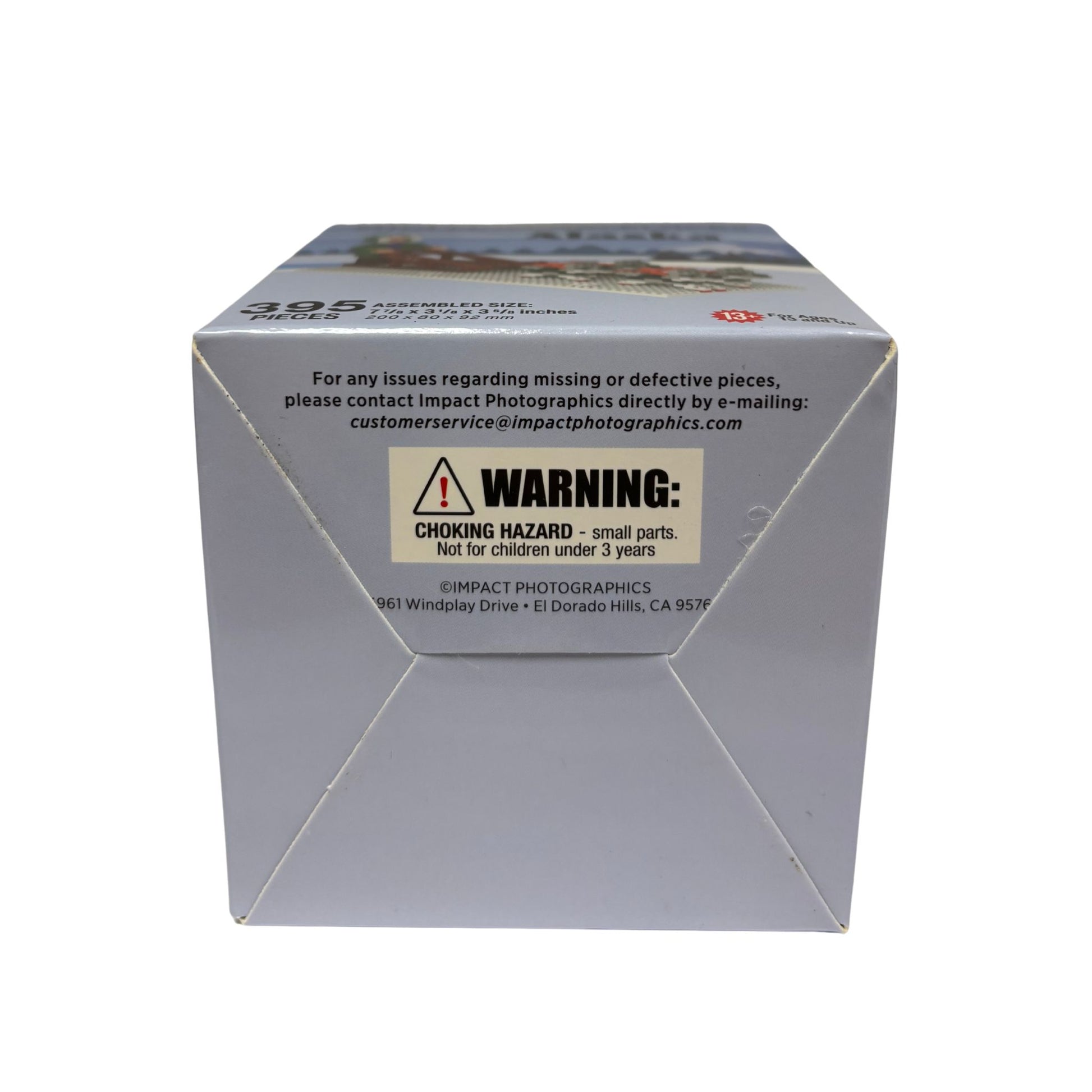 White box with warning label on a white background