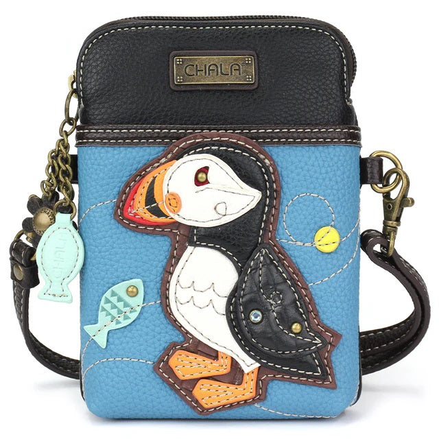 Blue crossbody bag with a puffin design and 'Chala' branding on a white background