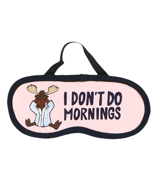 Sleep mask with cartoon moose and text 'I Don't Do Mornings' on a pink background