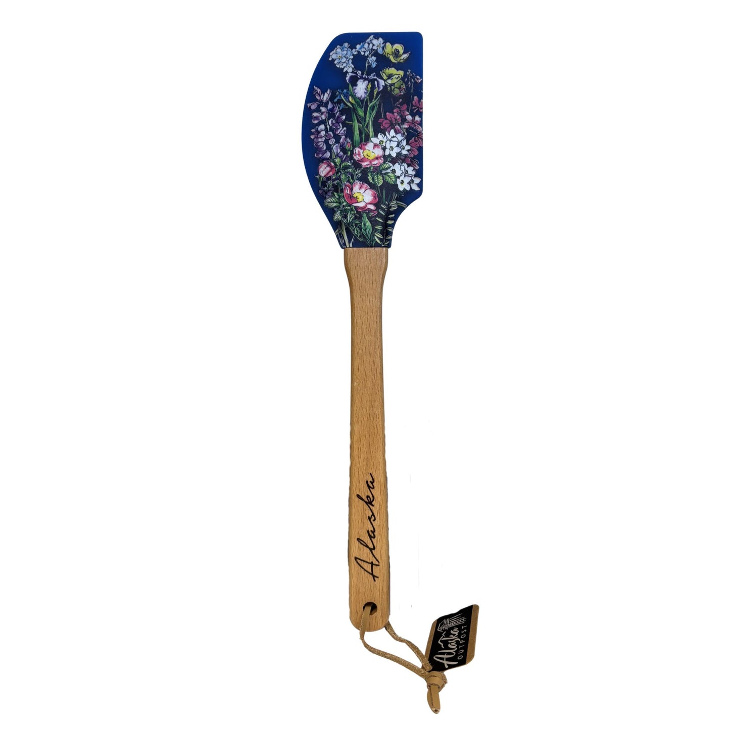 Spatula with floral design on the head and wooden handle, branded 'Alaska'.