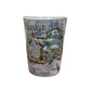 Alaska themed shot glass featuring wildlife and landmarks