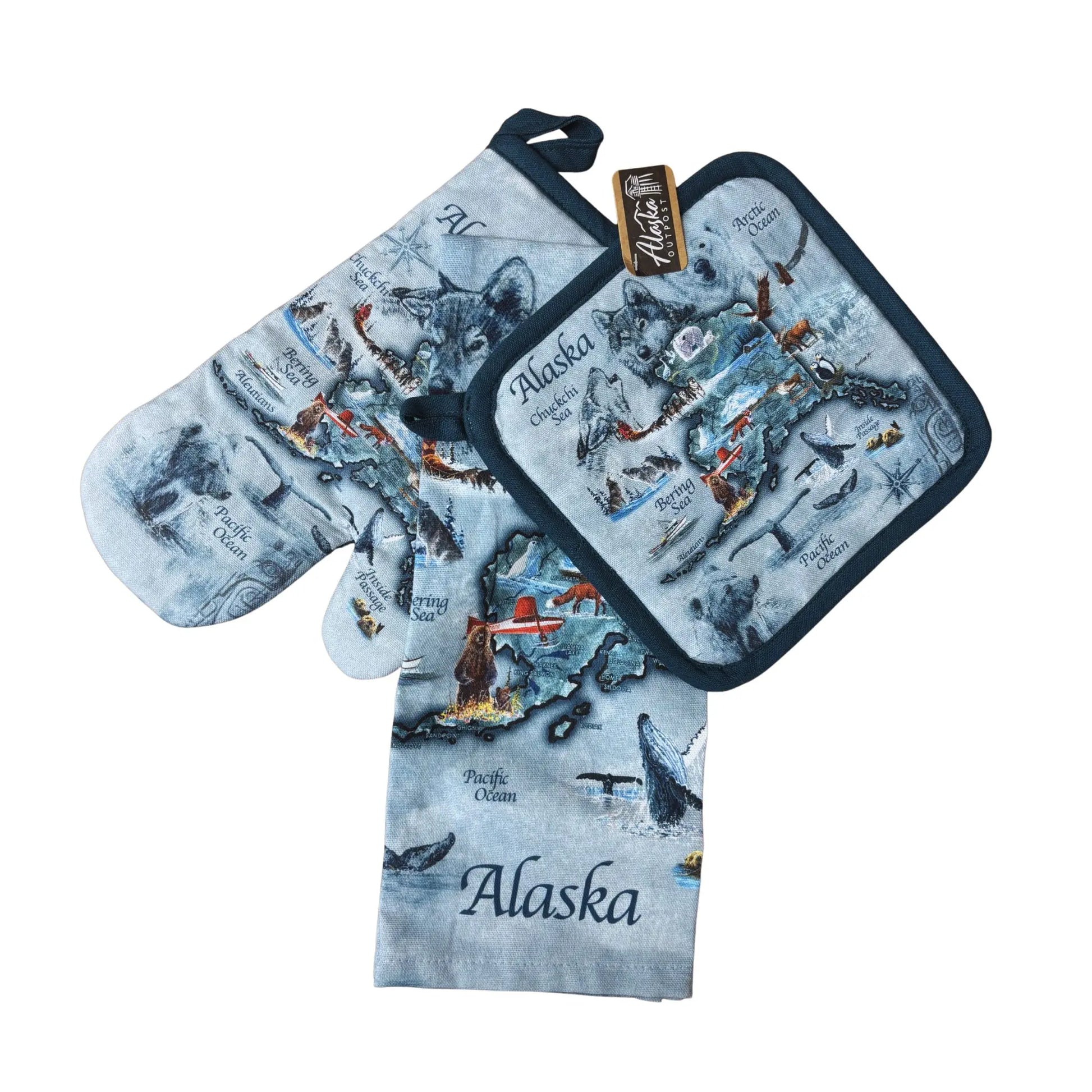 Set of blue oven mitt, potholder, and towel with Alaska design