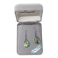 Teardrop-shaped earrings in a branded box with 'Wild Pearle' label.