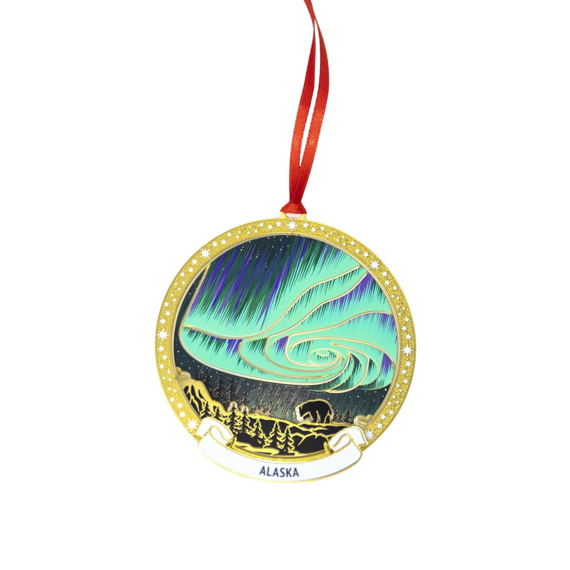 Brass ornament featuring the northern lights