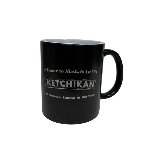 Black mug with text about Ketchikan, Alaska