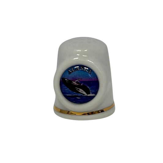 White porcelain thimble with a whale