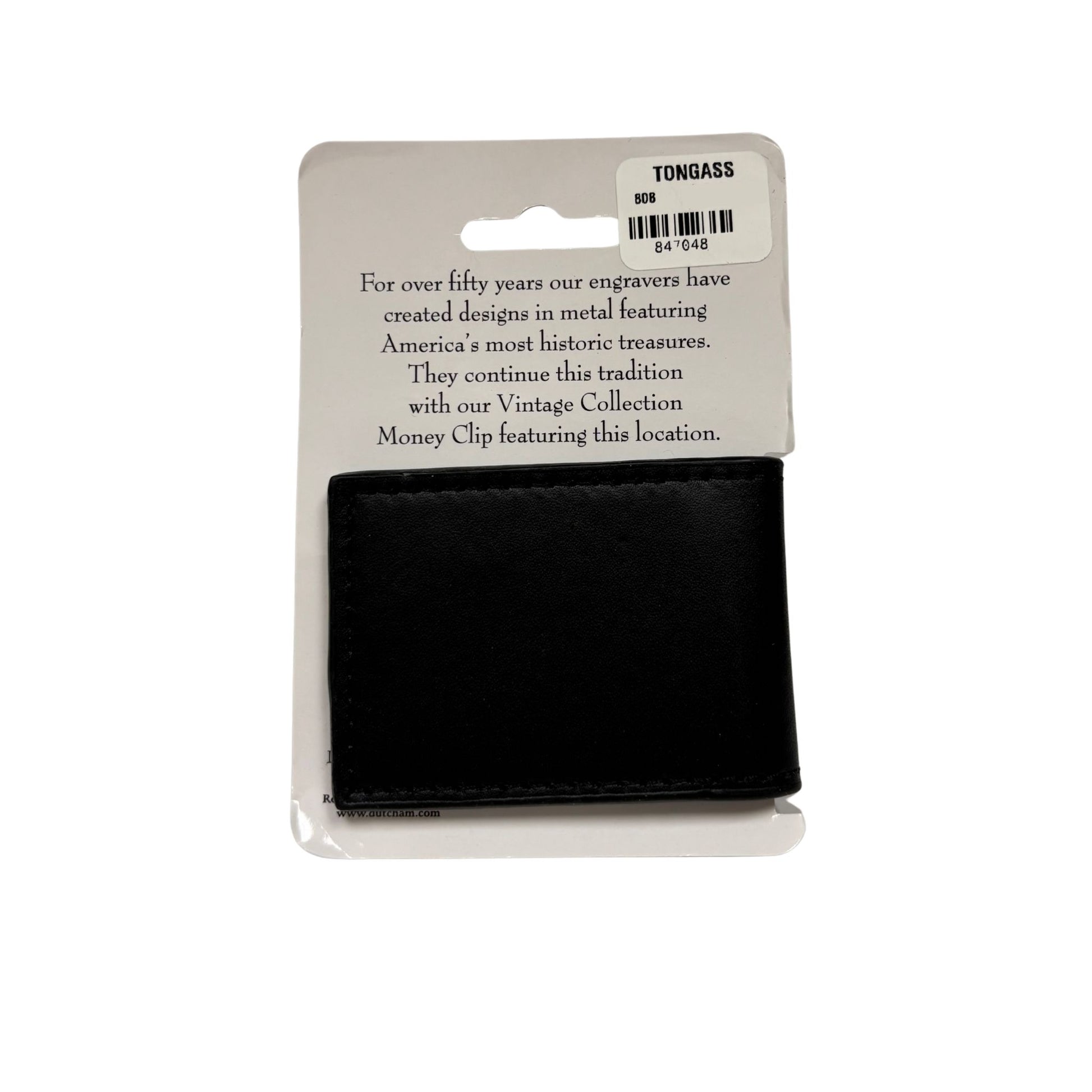 Black money clip on a white background with a TONGASS label.