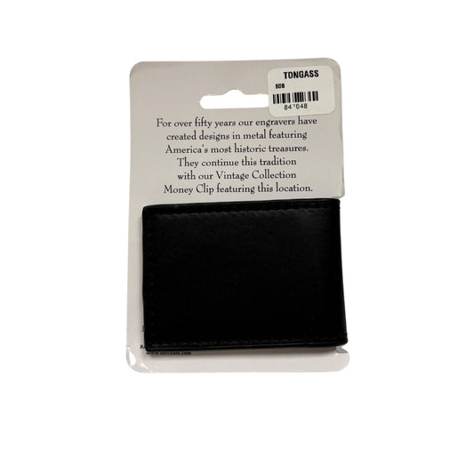 Black money clip on a white background with a TONGASS label.