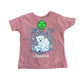 Pink t-shirt with a bear graphic and text 