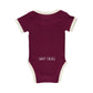 Maroon baby onesie with 'Sweet Cheeks' text on a white background