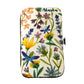 Floral design manicure set case with 'Alaska' text 