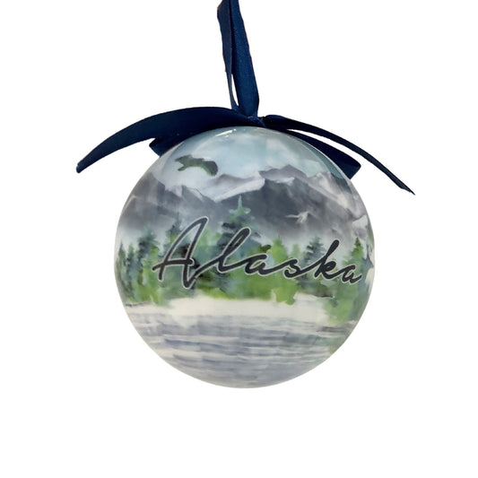 Spherical ornament with 'Alaska' text and mountain landscape 
