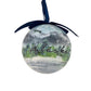 Spherical ornament with 'Alaska' text and mountain landscape 