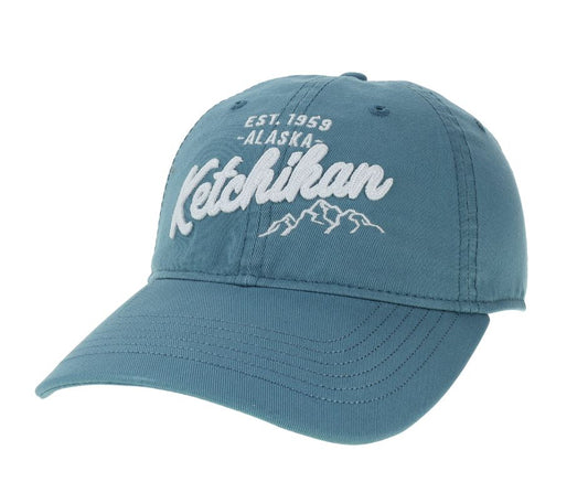 Blue cap with 'Ketchikan, Alaska' text on a white background