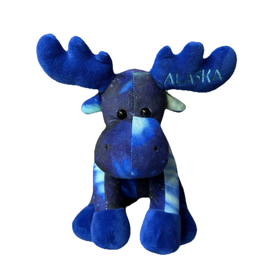 Blue plush moose toy with 'Alaska' text on a white background