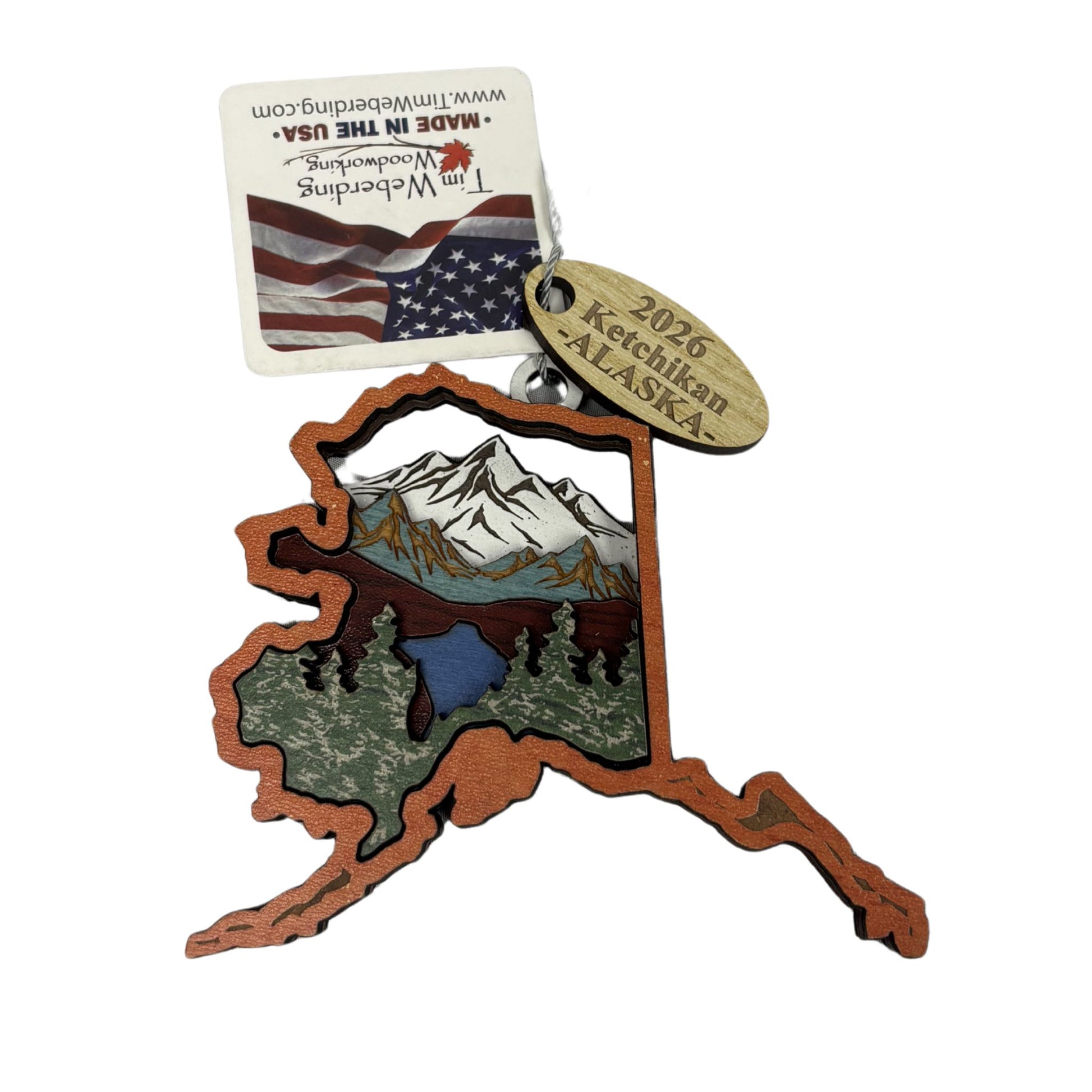 Wooden Alaska State outline ornament with mountain and nature designs