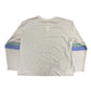 Light long-sleeve shirt with blue and green accents on sleeves against a white background