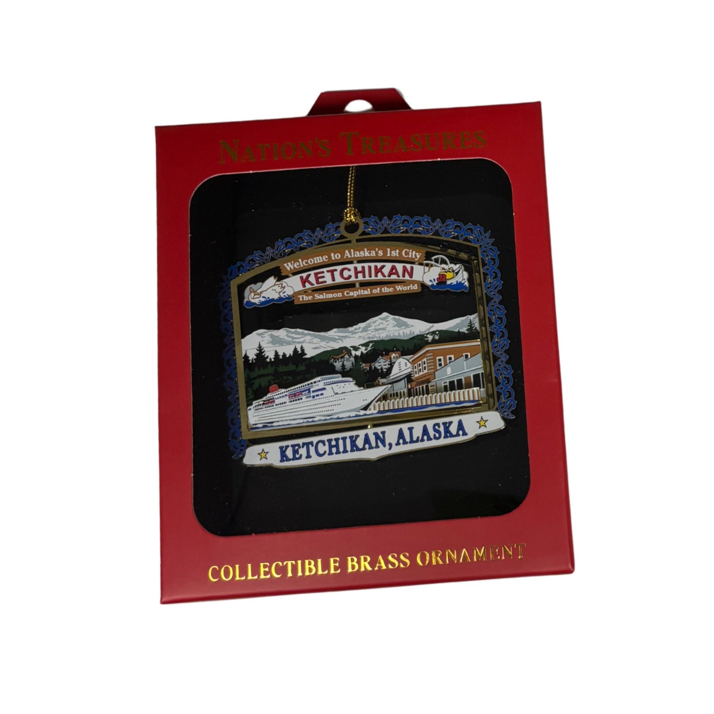 Collectible brass ornament of Ketchikan, Alaska in packaging with red box.