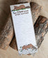 Notepad with cartoon beaver design and text 'One Dam Thing After Another' on a wooden background
