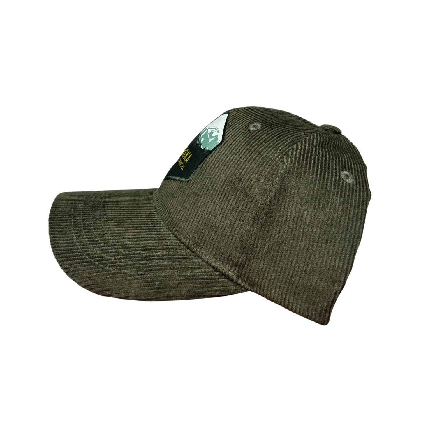 Green corduroy cap on a white background