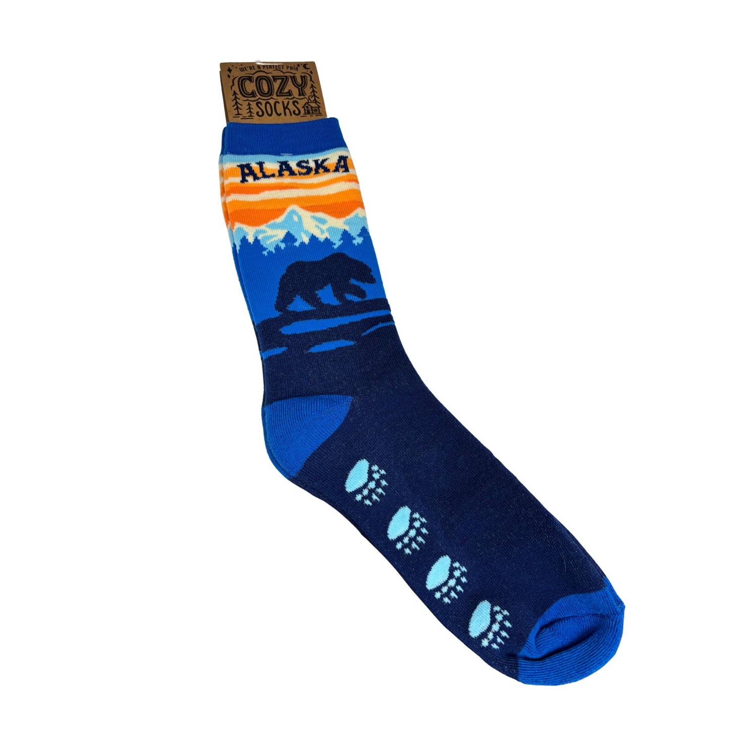Blue sock with bear and mountain design, labeled 'Alaska'