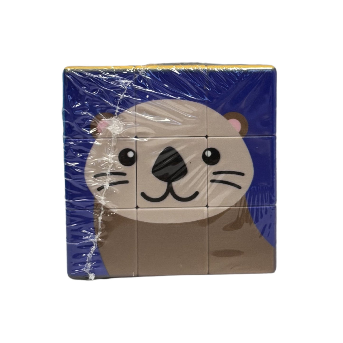 Packaged children's puzzle cube with a sea otter design